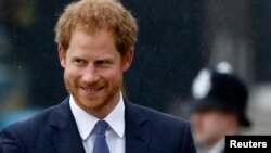 FILE - Britain's Prince Harry attends the Metropolitan Police Service Annual Ceremony of Remembrance for colleagues who lost their lives in the line of duty, at the Metropolitan Police Training College in London, Oct. 20, 2016. 