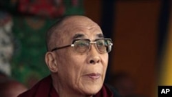 Tibetan spiritual leader the Dalai Lama looks on during the commemoration of the anniversary of the 1959 Tibetan uprising against Chinese rule in Dharmsala, India, March 10, 2011