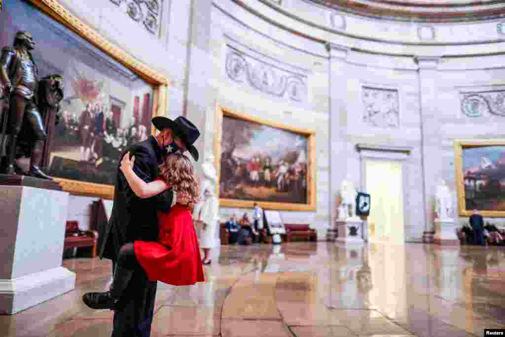 Representative-elect Troy Nehls (R-TX) hugs his daughter Tori Nehls in the U.S. Capitol in Washington, D.C., Jan. 3, 2021.