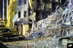 This undated photo provided by the FBI shows damage to the Pentagon caused during the 9/11 attacks. This was one of 27 photos that were posted to the FBI website in 2011 but disappeared recently because of a technical glitch.