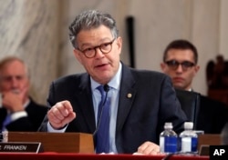 FILE - Senate Judiciary Committee member Senator Al Franken, D-Minn. questions Attorney General-designate, Senator Jeff Sessions, R-Ala., on Capitol Hill in Washington, Jan. 10, 2017, during the committee's confirmation hearing for Sessions.