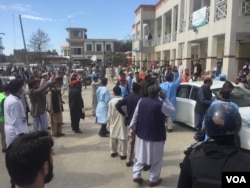 People gather at scene of suicide bombing that targeted a court in Charsadda, Pakistan, Feb. 21, 2017. (Photo: A. Momand / VOA Deewa Service)