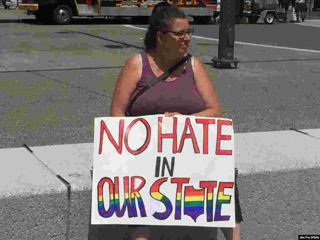 Nancy Ballou of Cleveland said she opposes the presumptive Republican presidential nominee Donald Trump, citing what she called his xenophic, racist and anti-woman message, in the Public Square in downtown Cleveland, July 18, 2016.