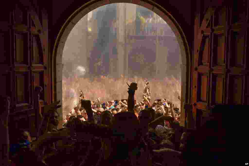 Revelers enter in City Hall at the end of the &#39;Cipotegato&#39;, in the small village of Tarazona, northern Spain.