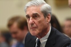 U.S. -- Former Special Counsel Robert Mueller listens as he testifies before the House Select Committee on Intelligence hearing on Capitol Hill in Washington, July 24, 2019