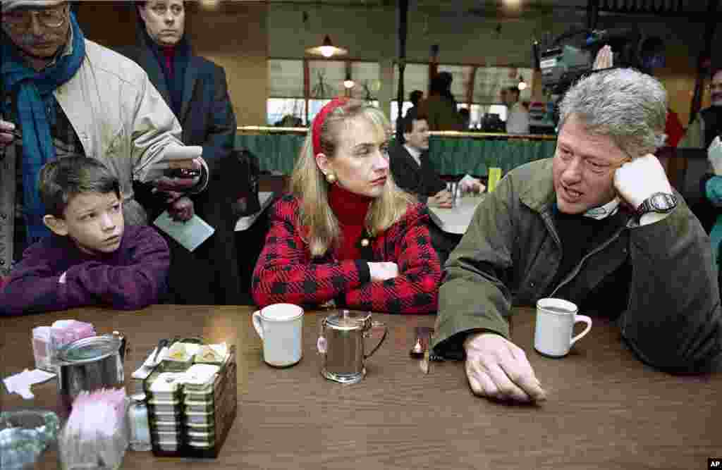 Gov. Bill Clinton of Arkansas and his wife Hillary Rodham Clinton stop at Blake’s Restaurant in Manchester, New Hampshire on Saturday, Feb. 15, 1992 for a cup of coffee prior to a door-to-door campaign drive. (AP Photo/Stephan Savoia)