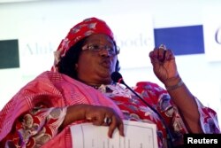 FILE - Former President of Malawi Joyce Banda speaks during a conference on women in development programme in Lagos, Nigeria, July 28, 2016.