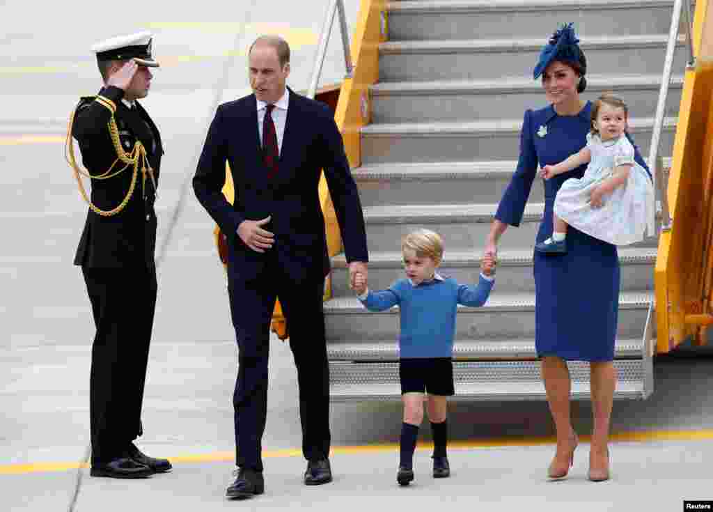 Britain's Prince William, Catherine, Duchess of Cambridge, Prince George and Princess Charlotte arrive at the Victoria International Airport for the start of their eight day royal tour to Canada in Victoria, British Columbia, Canada, Sept. 24, 2016.