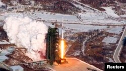A video grab from KCNA shows the Unha-3 (Milky Way 3) rocket launching at North Korea's West Sea Satellite Launch Site, at the satellite control center in Cholsan county, North Pyongang province, Dec. 13, 2012.