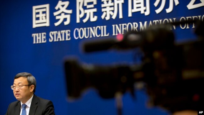 中国商务部副部长王受文2018年6月28日参加新闻发布会,就最新发表的《中国与世界贸易组织》白皮书介绍情况。