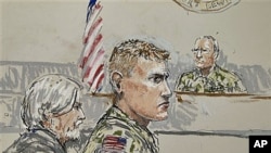 U.S. Army Staff Sgt. Calvin Gibbs (C) is shown in this courtroom sketch, with Phillip Stackhouse, Gibbs' civilian attorney (L), and Investigating Officer Col. Thomas P. Molloy (R), who is overseeing the Article 32 hearing in a military courtroom on Joint 