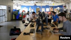 It is almost impossible to think of work without email. Here, people work at their computers at a technology company in San Francisco, California, April 2014. (REUTERS)