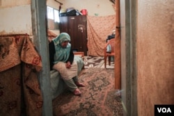 Eishi Ibraham Ayash was born in Palestine and had to flee refugee camps in Lebanon three times because of violence. She has little hope that she will be rehoused. (John Owens for VOA)