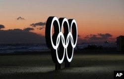 Olympic rings are placed at the beach before sunrise in Gangneung, South Korea, Jan. 24, 2018. Gangneung is the site of the coastal cluster which will host ice hockey, figure skating, speedskating, short track and curling for the 2018 Olympics from Feb.