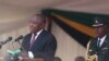 Le président sud-africain Cyril Ramaphosa prononce son discours lors de la cérémonie d'enterrement de l'ancien dirigeant zimbabwéen Robert Mugabe au stade national de Harare, le 14 septembre 2019. (AP Photo/Tsvangirayi Mukwazhi)