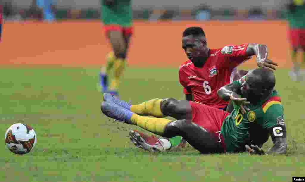 Gambia&#39;s Sulayman Marreh in action with Cameroon&#39;s Vincent Aboubakar, Cameroon, Jan. 29, 2022.