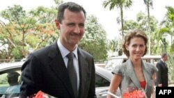 Башар Асад с супругой Асмой Асад. Архивное фото.