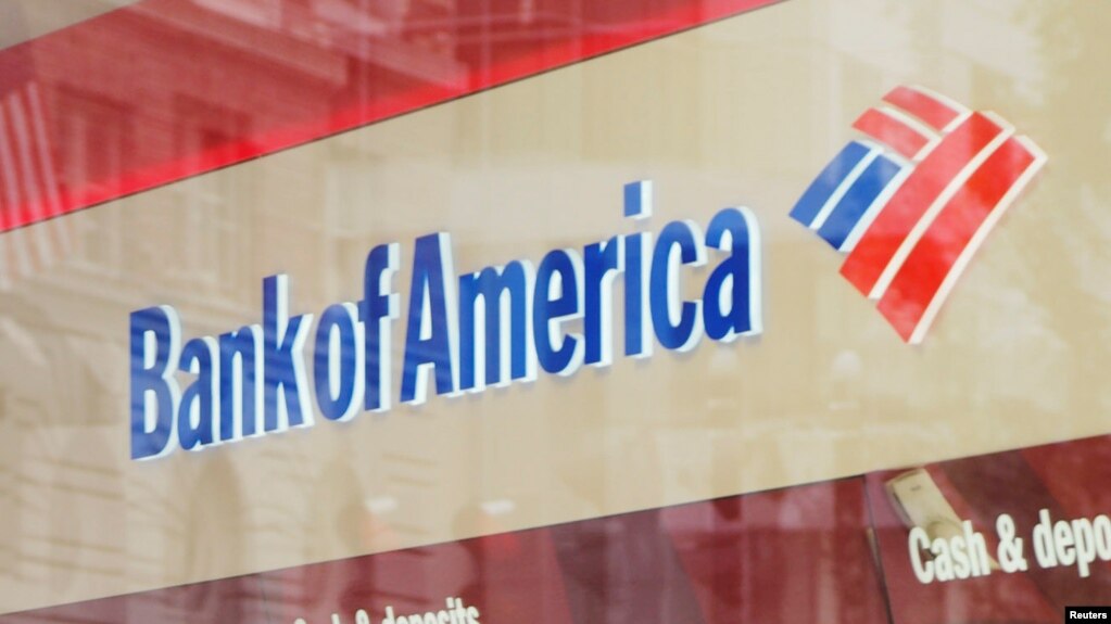 FILE - A customer uses an ATM at a Bank of America branch in Boston, Massachusetts, U.S.