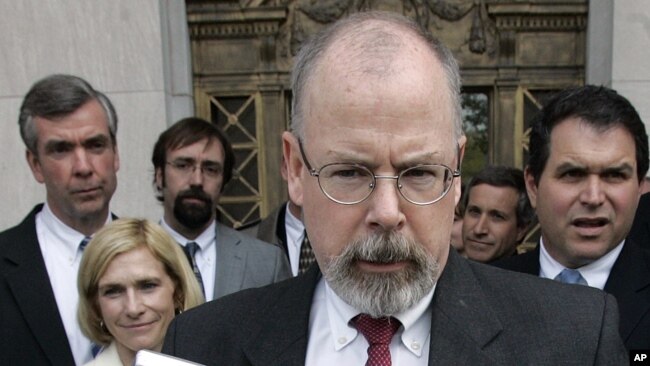 FILE - John Durham speaks to reporters on the steps of U.S. District Court in New Haven, Conn., April 25, 2006.