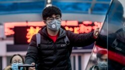 Corona ဗိုင်းရပ် ထိန်းချုပ်နိုင်ရေး တရုတ် ဝူဟန်မြို့ အဝင်အထွက် ပိတ်ပင်