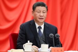 中共黨媒新華社發布的中國領導人習近平在北京舉行的中紀委第六次全體會議上講話的照片 （2022年1月18日）