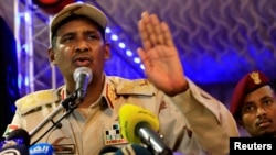 General Mohamed Hamdan Dagalo, head of the Rapid Support Forces and deputy head of the Transitional Military Council speaks after the Ramadan prayers and Iftar organized by Sultan of Darfur Ahmed Hussain in Khartoum, Sudan, May 18, 2019.