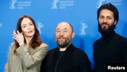 Director Timur Bekmambetov and actors Valene Kane and Shazad Latif pose during a photocall to promote the movie Profile at the 68th Berlinale International Film Festival in Berlin, Germany, February 17, 2018.