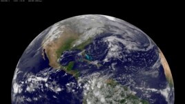 The planet Earth is seen in a photo taken by NOAA's GOES-East satellite on Earth Day, April 22, 2014. (REUTERS/NOAA/)