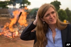 U.S. Ambassador to the United Nations Samantha Power stands near the first Cameroon Ivory Burn at the Palais des Congres in Yaounde, Cameroon, which was lit to highlight the need to halt the Ivory trade in order to save Africa's elephants, April 19, 2016.