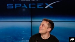 Elon Musk, founder, CEO, and lead designer of SpaceX, speaks at a news conference after the Falcon 9 SpaceX heavy rocket launched successfully from the Kennedy Space Center in Cape Canaveral, Florida, Feb. 6, 2018.