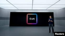 Apple's senior vice president of Hardware Engineering John Ternus talks about the M1 processor used in iPad Pro and iMac, in this still image from the keynote video of a special event at Apple Park in Cupertino, California, U.S. released April 20, 2021. A