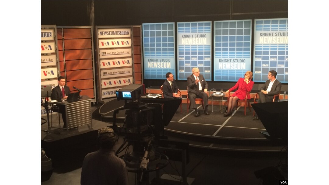 Right to left: Lorenzo Vidino, Baroness Emma Nicholson of Winterbourne, Gene Policinski and Mil Arcega discuss ISIS's use of propaganda as Andrew Palczewski, far left, monitors social media during a town hall event at the Newseum, Oct. 21, 2015.