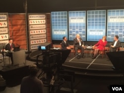 Right to left: Lorenzo Vidino, Baroness Emma Nicholson of Winterbourne, Gene Policinski and Mil Arcega discuss ISIS's use of propaganda as Andrew Palczewski, far left, monitors social media during a town hall event at the Newseum, Oct. 21, 2015.