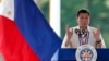FILE - Philippine President Rodrigo Duterte gestures while speaking following a wreath-laying ceremony in observance of National Heroes Day, Aug. 29, 2016 at the Heroes Cemetery in suburban Taguig city, east of Manila.