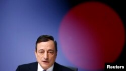 Mario Draghi annonçant le programme de rachats d'obligations d'Etat de la BCE (Reuters)