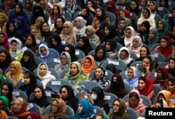 Afghan women attend a consultative grand assembly, known as Loya Jirga, in Kabul, Afghanistan, April 29, 2019.