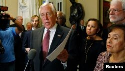 FILE - U.S. House Minority Whip Steny Hoyer speaks to the media at the Capitol in Washington.