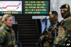 Soldiers patrol at Maelbeek metro station in Brussels, Belgium, April 25, 2016.