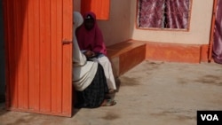 Rahmatu Ibrahim and Naja’atu Abdullahi, both 14, are runaway brides. They say they hope their parents will eventually forgive them for running away. (C. Oduah/VOA)