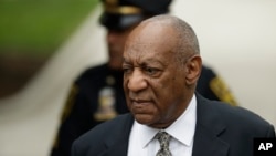 FILE - Bill Cosby arrives at the Montgomery County Courthouse during his sexual assault trial, June 15, 2017, in Norristown, Pennsylvania.