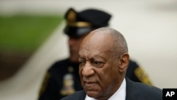 Bill Cosby arrives at the Montgomery County Courthouse during his sexual assault trial, June 15, 2017, in Norristown, Pa.