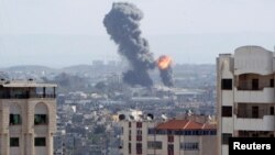 An explosion is seen during Israeli airstrikes in Gaza, Oct. 27, 2018. 