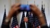 Seorang wartawan menggunakan ponselnya untuk merekam Presiden Donald Trump dalam konferensi pers di sela sidang Majelis Umum PBB di New York, 26 September 2018.