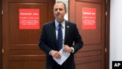 FILE - Rep. Adam Schiff, D-Calif., ranking member of the House Permanent Select Committee on Intelligence, leaves a secure area where the panel meets as Democrats seek to push back against a classified memo released by Republicans last week .