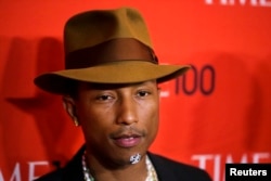 Honoree and singer Pharrell Williams arrives at the Time 100 gala celebrating the magazine's naming of the 100 most influential people in the world for the past year, in New York April 29, 2014.