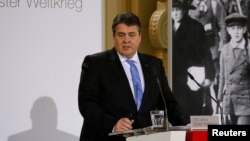 German Economy Minister and head of the Social Democratic Party (SPD) Sigmar Gabriel addresses a ceremony, held by the SPD, to mark the 100th anniversary of the start of World War One, at the French cathedral in Berlin, April 14, 2014. 