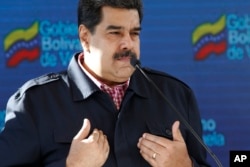 FILE - Venezuela's President Nicolas Maduro speaks after voting in local elections in Caracas, Venezuela, Dec. 9, 2018.