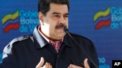 FILE - Venezuela's President Nicolas Maduro speaks after voting in local elections in Caracas, Venezuela, Dec. 9, 2018.