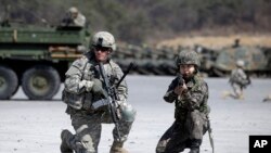 Exercices de l’armée américaine à Pocheon, au nord de Séoul, en Coree du Sud, le 25 mars 2015.