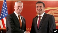 U.S. Defense Secretary James Mattis, left, shakes hands with Macedonian Prime Minister Zoran Zaev during their meeting in Skopje, Macedonia, Sept. 17, 2018. Zaev met with Vice President Mike Pence in Washington, Sept. 20, 2018.